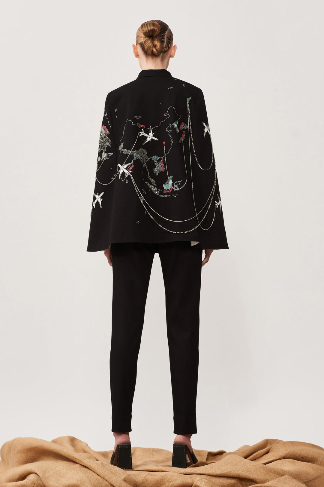 Dee Ghose in Map Cape With Narrow Pants