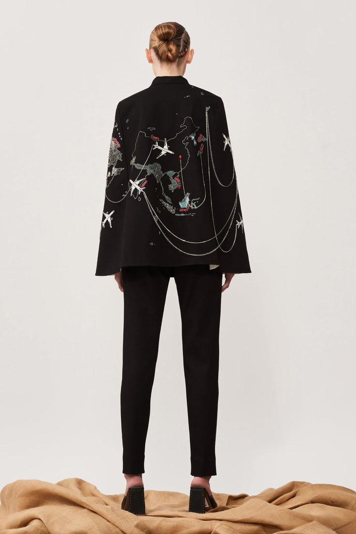 Dee Ghose in Map Cape With Narrow Pants