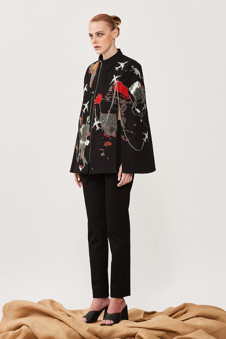 Dee Ghose in Map Cape With Narrow Pants