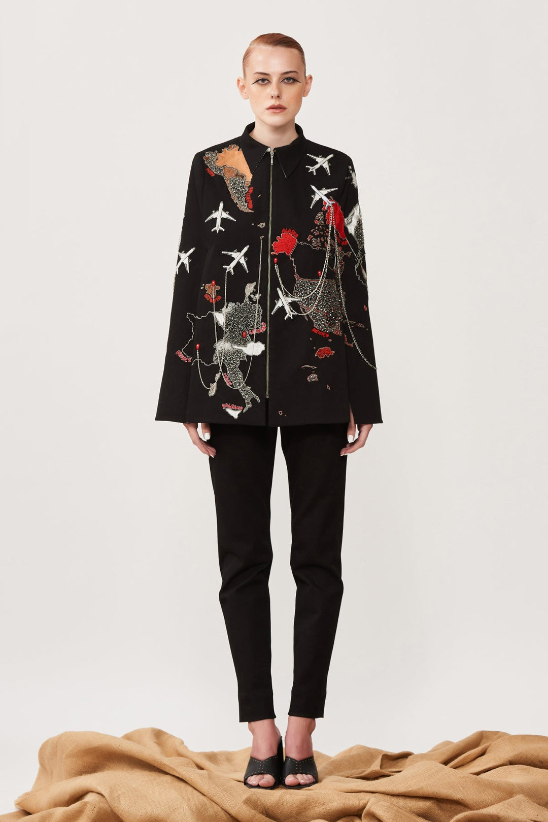 Dee Ghose in Map Cape With Narrow Pants