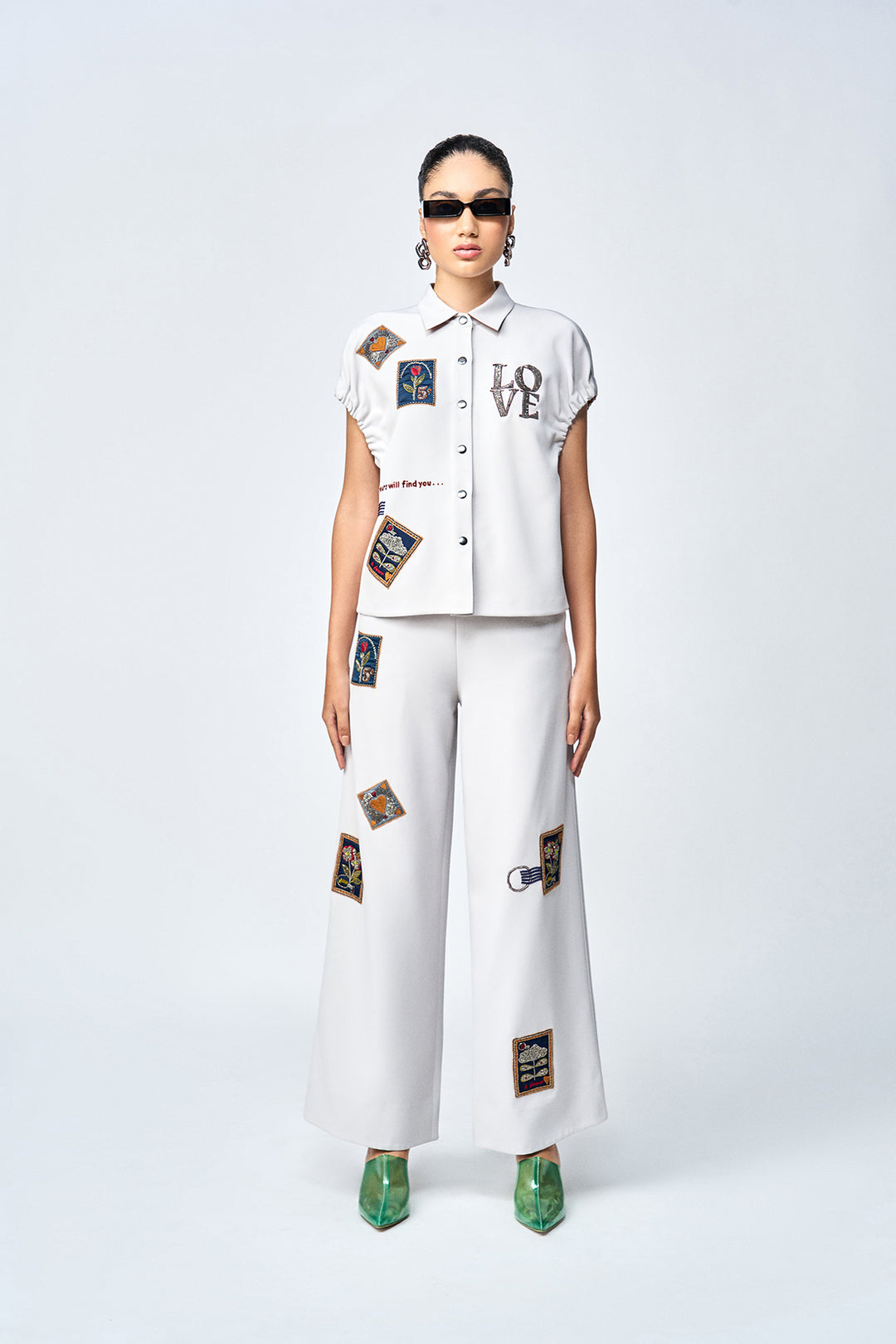 FLARED PANTS OF ( STAMP ELASTICATED TOP )