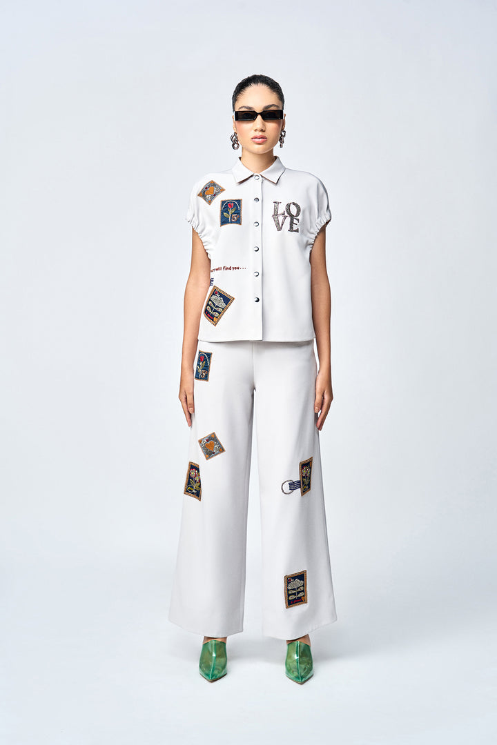 FLARED PANTS OF ( STAMP ELASTICATED TOP )