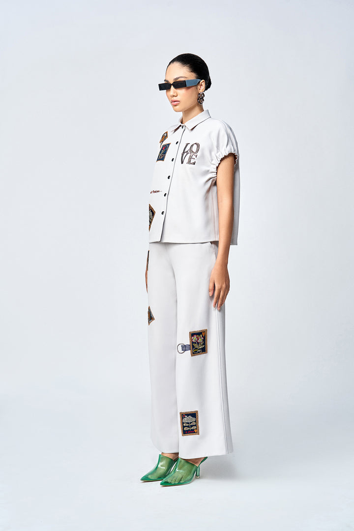 FLARED PANTS OF ( STAMP ELASTICATED TOP )