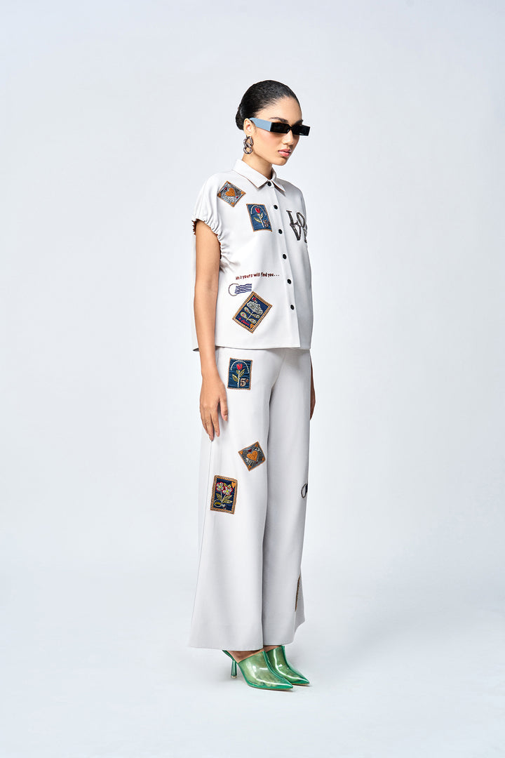 FLARED PANTS OF ( STAMP ELASTICATED TOP )