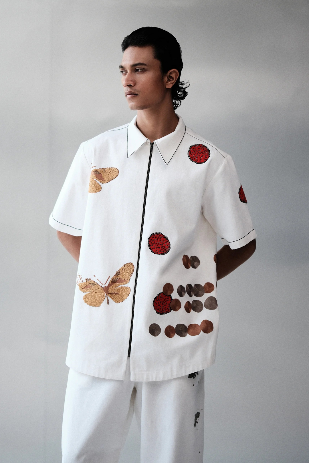 CIRCLE AND FLUTTER HALF SLEEVE SHIRT