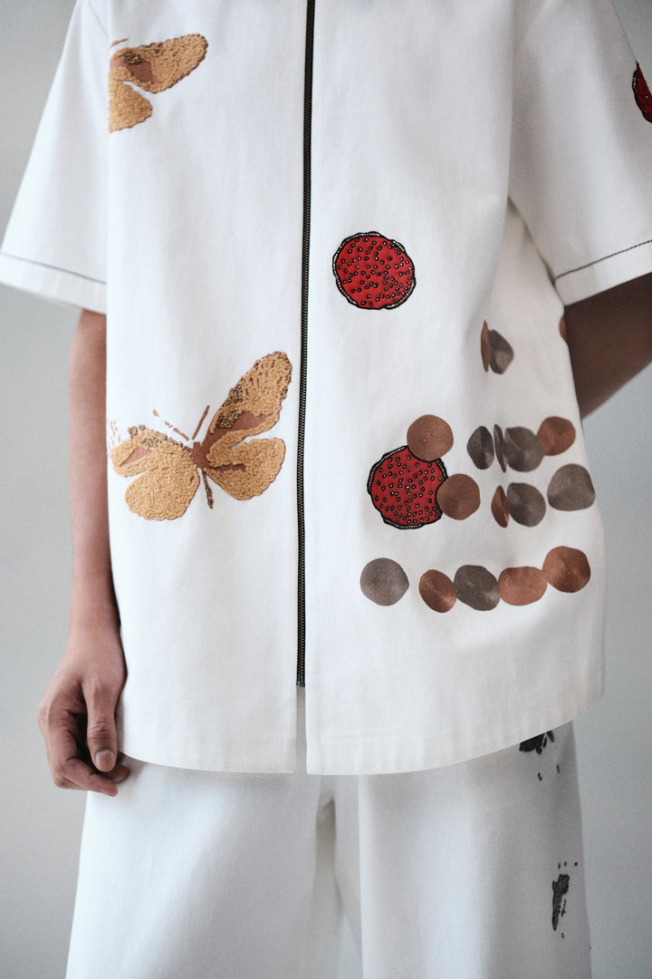 CIRCLE AND FLUTTER HALF SLEEVE SHIRT
