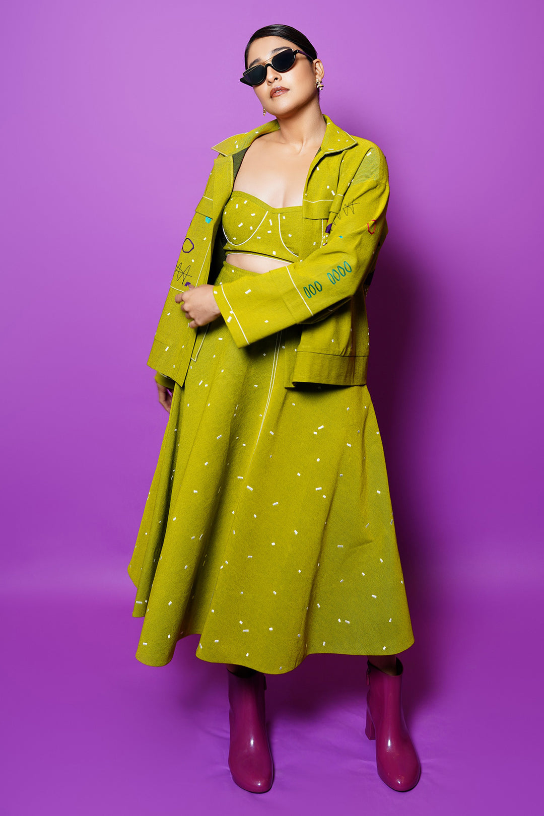 Regina Cassandra In Abstract Shapes And Ostrich Jacket With Circular Skirt And Corset