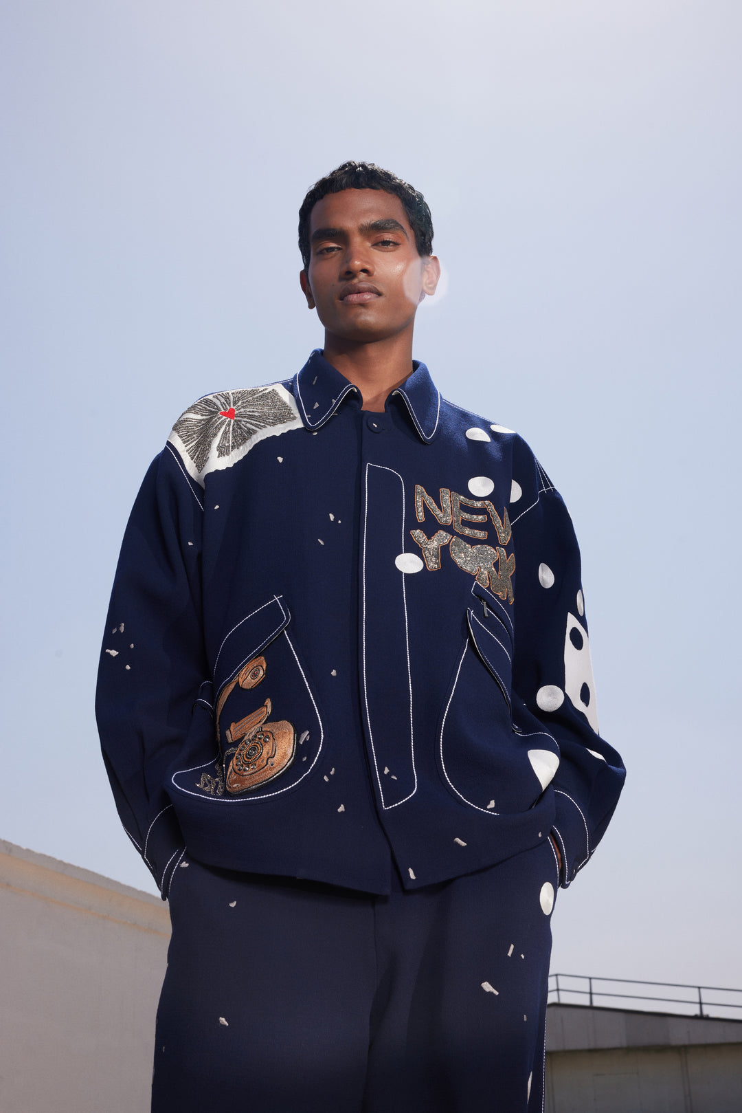 TELEPHONE AND TEXT JACKET WITH BAGGY PANTS