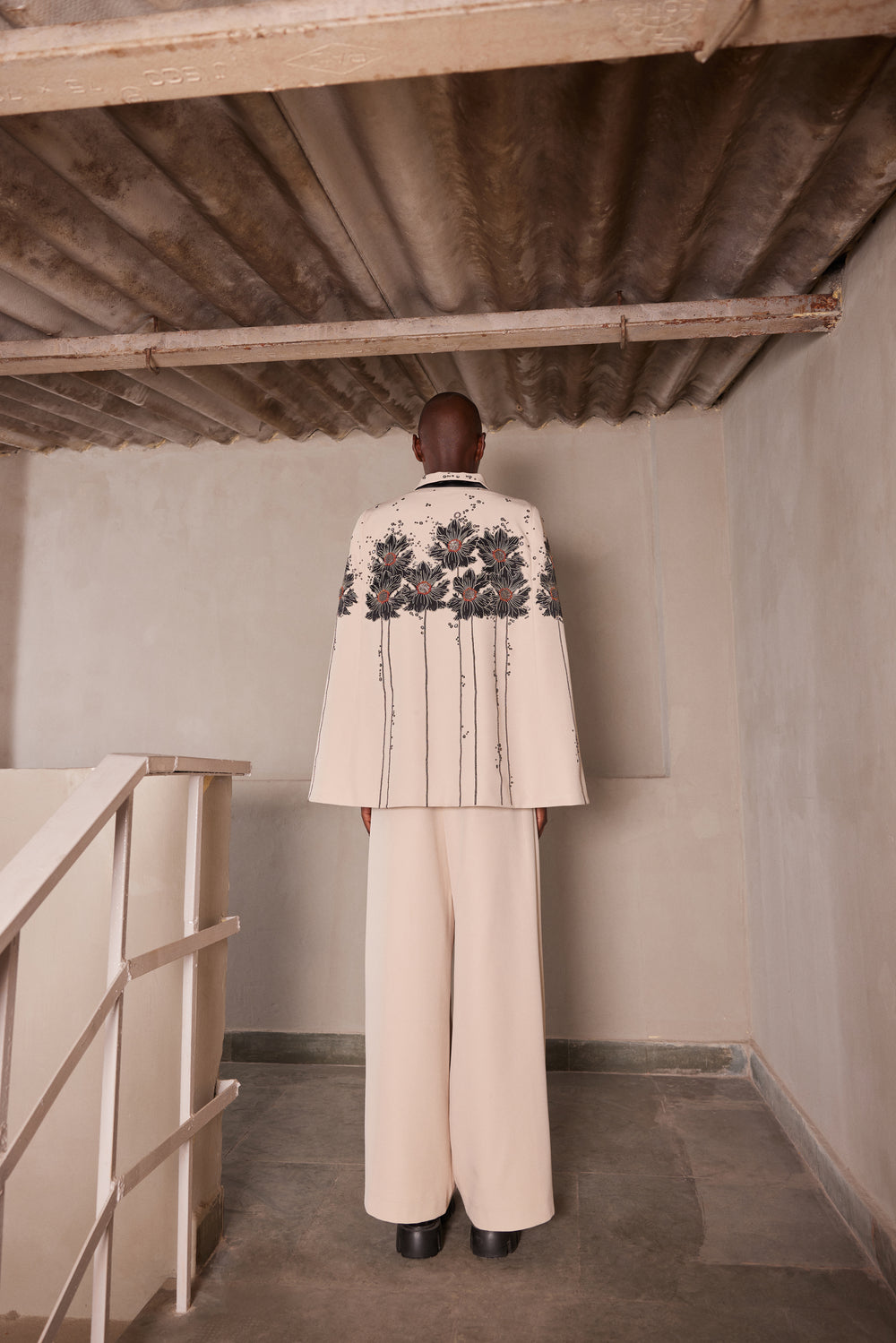 FLORAL PATCH CAPE WITH FLARED PANTS