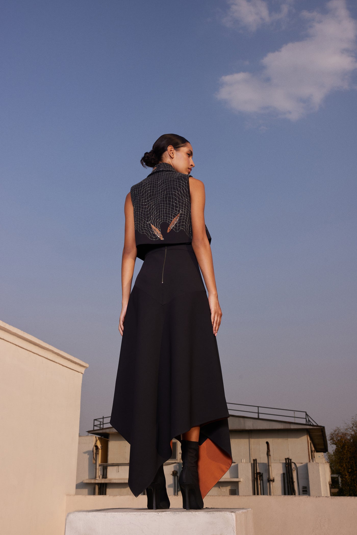 ASYMMETRIC SKIRT OF ( FISH IN THE NET' CROPED SLEEVELESS JACKET)