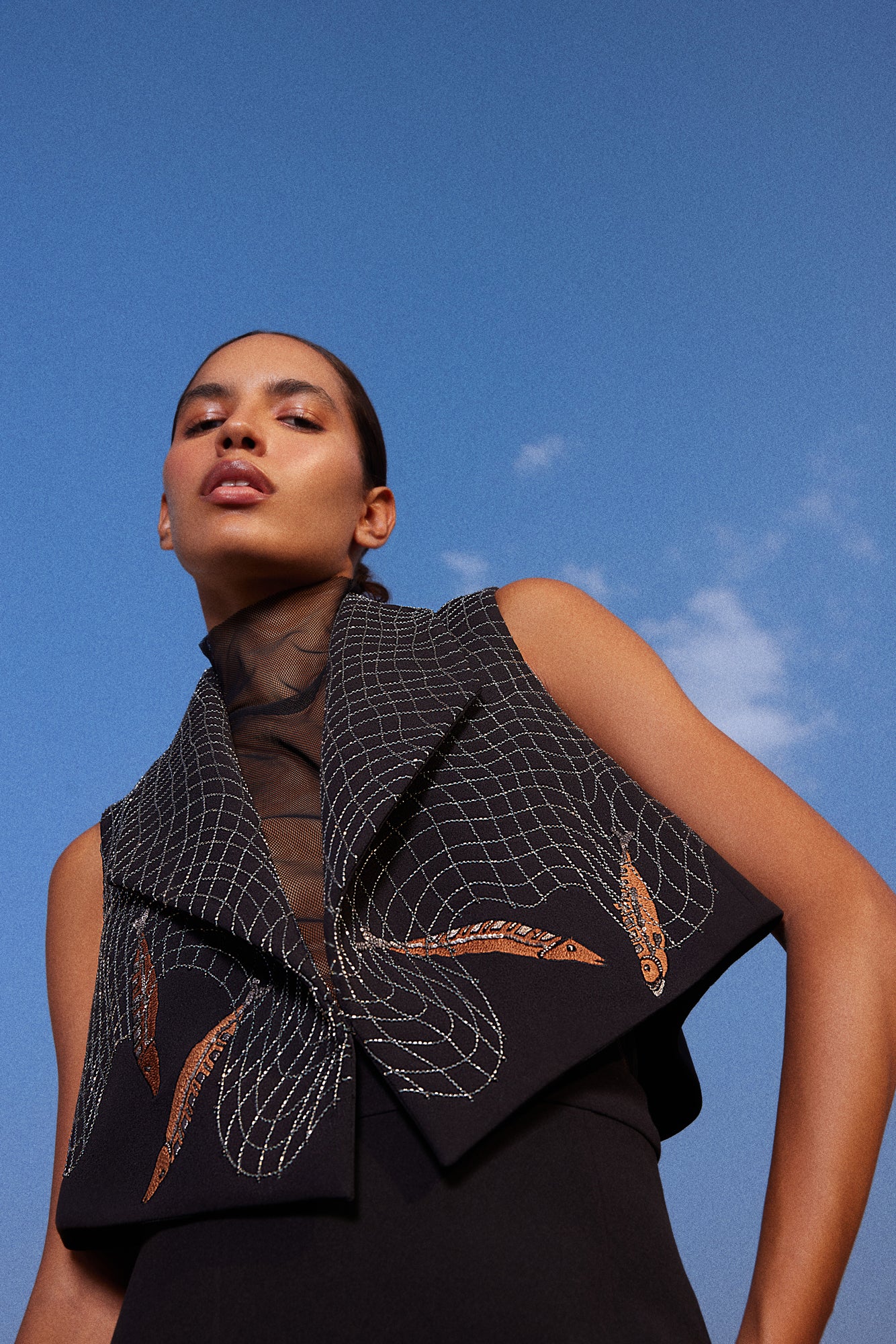 FISH IN THE NET' CROPED SLEEVELESS JACKET WITH ASYMMETRIC SKIRT