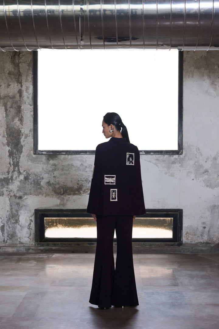 BUG STAMP CAPE WITH BELL BOTTOM PANTS