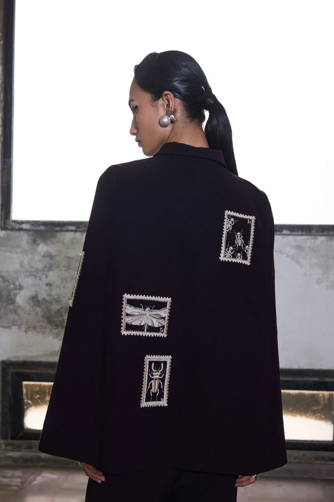 BUG STAMP CAPE WITH BELL BOTTOM PANTS
