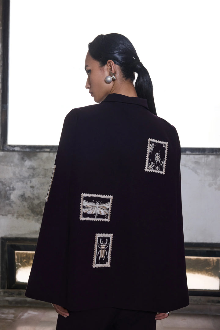 BUG STAMP CAPE WITH BELL BOTTOM PANTS