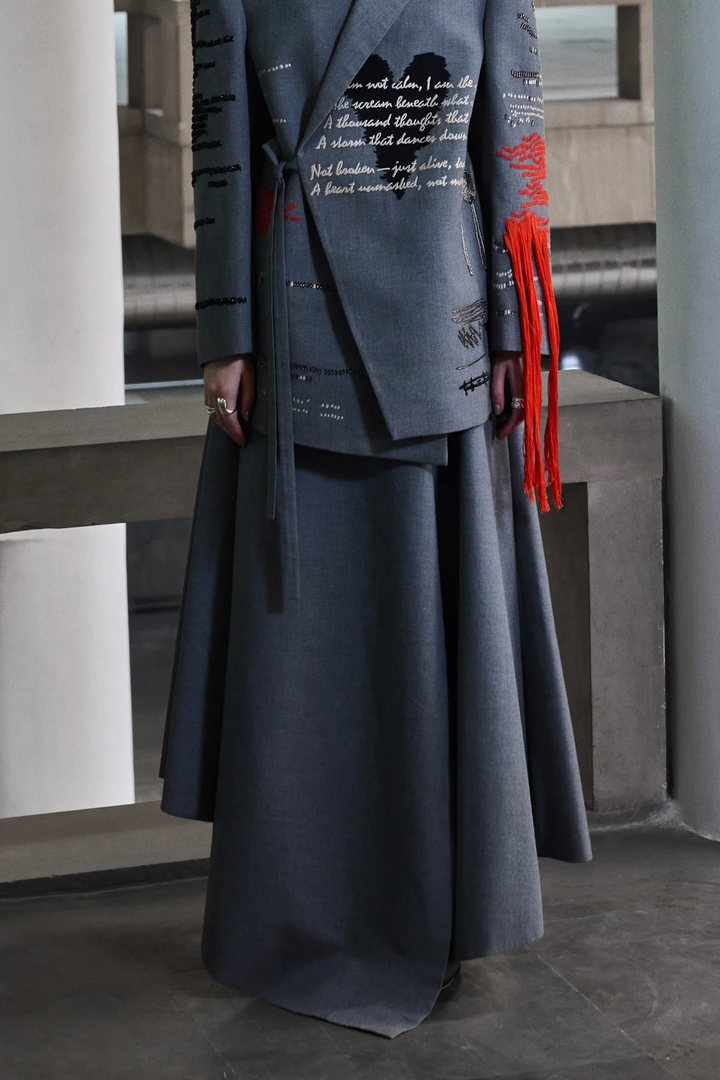 ASYMMETRIC DRAPED SKIRT OF ( CUTLERY WRAP JACKET )