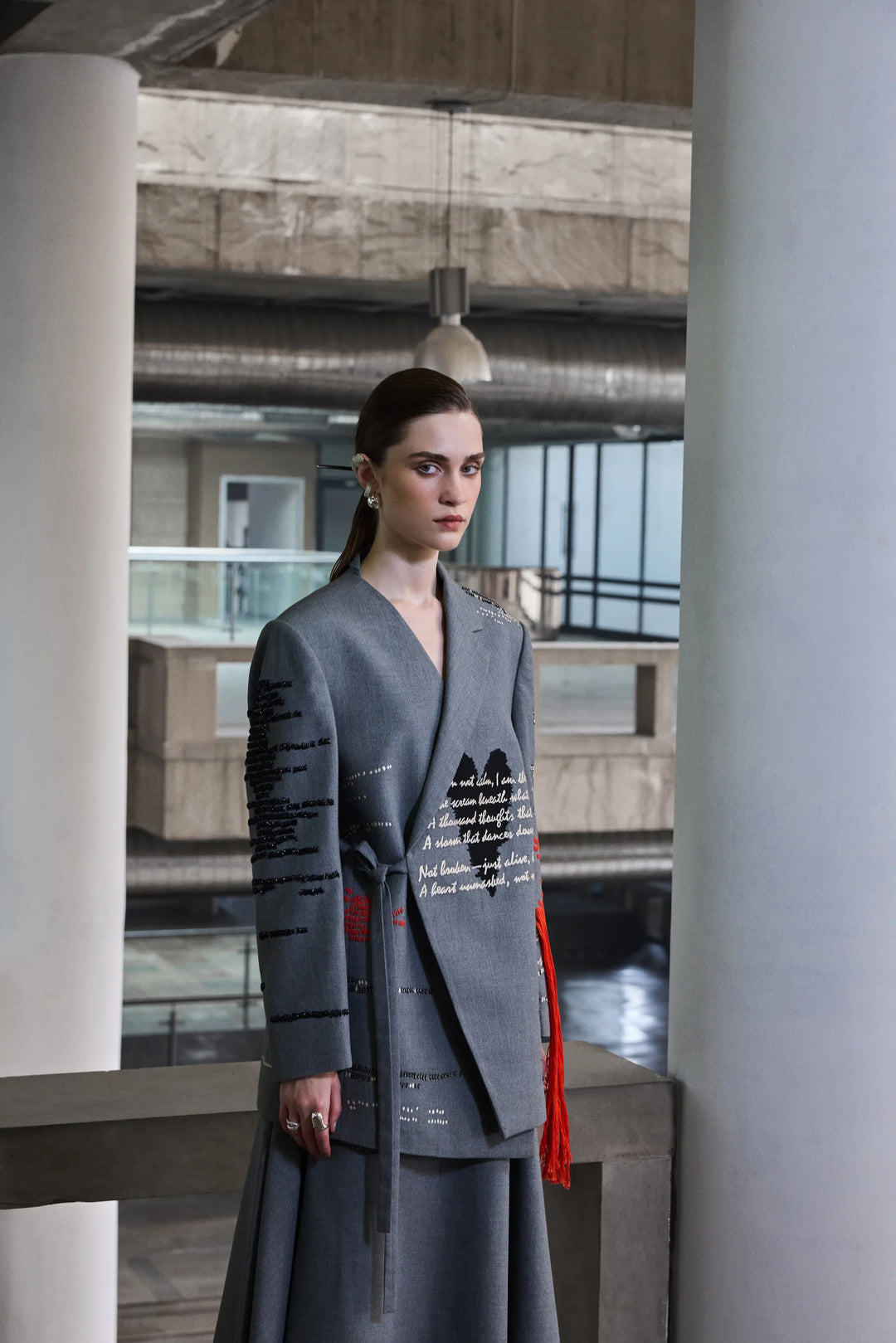ASYMMETRIC DRAPED SKIRT OF ( CUTLERY WRAP JACKET )