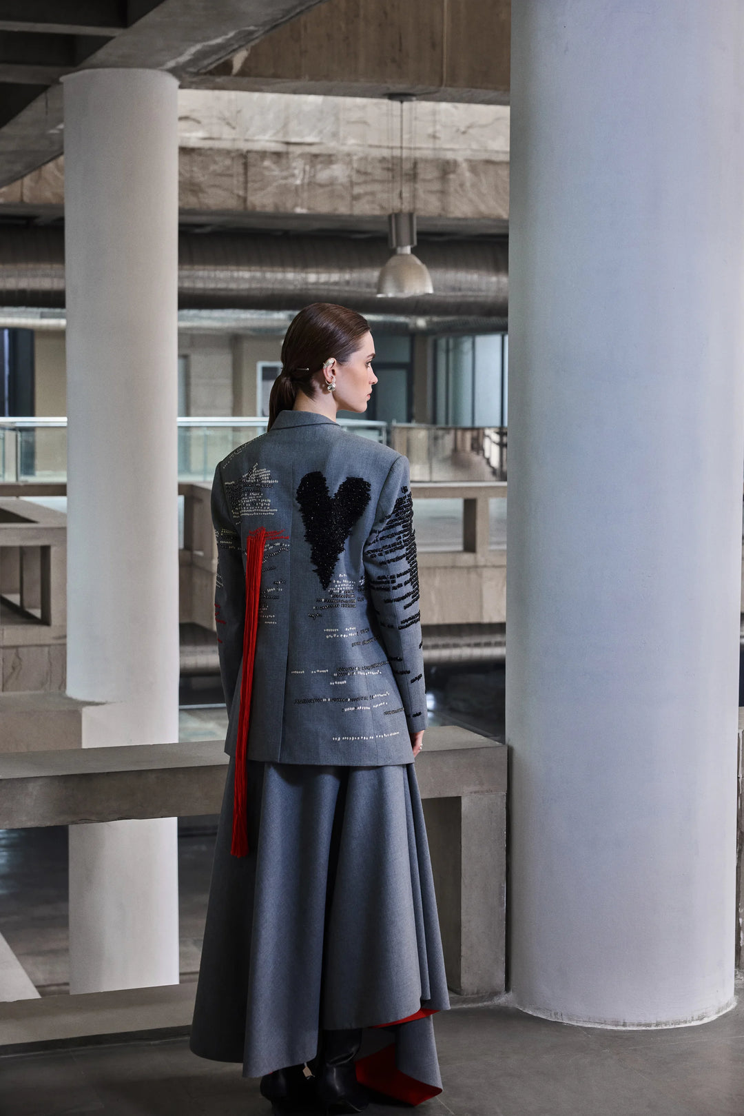ASYMMETRIC DRAPED SKIRT OF ( CUTLERY WRAP JACKET )