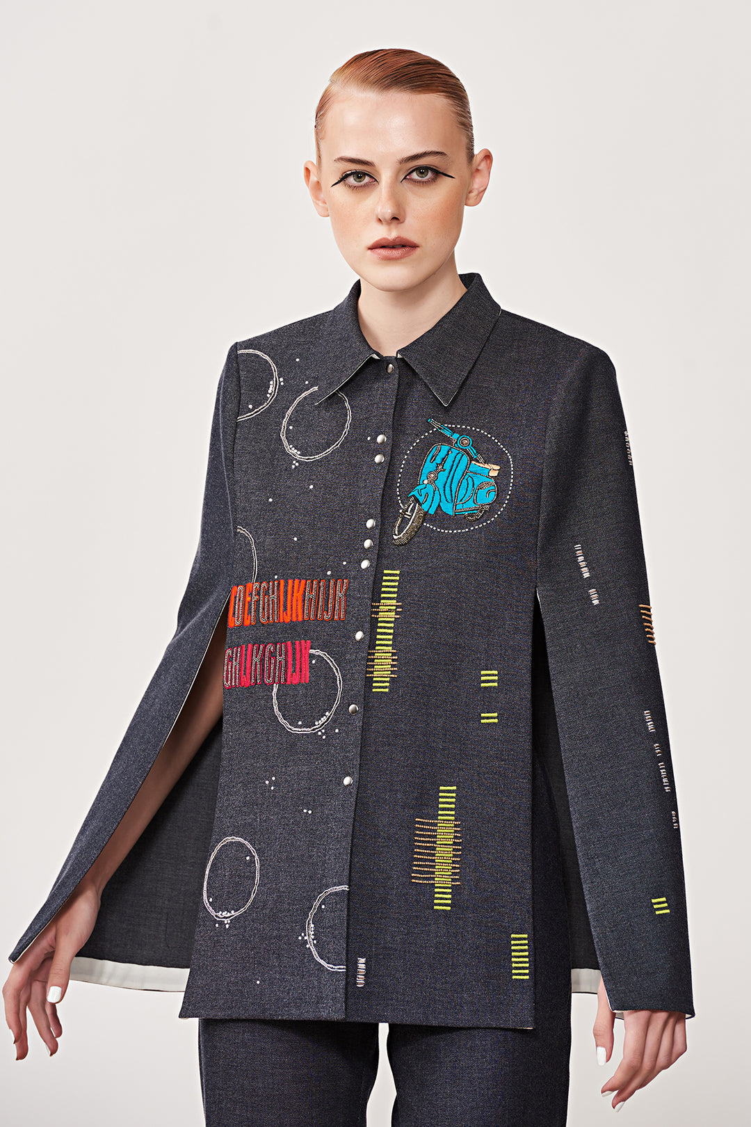 Ride a Vespa Cape With Narrow Pants
