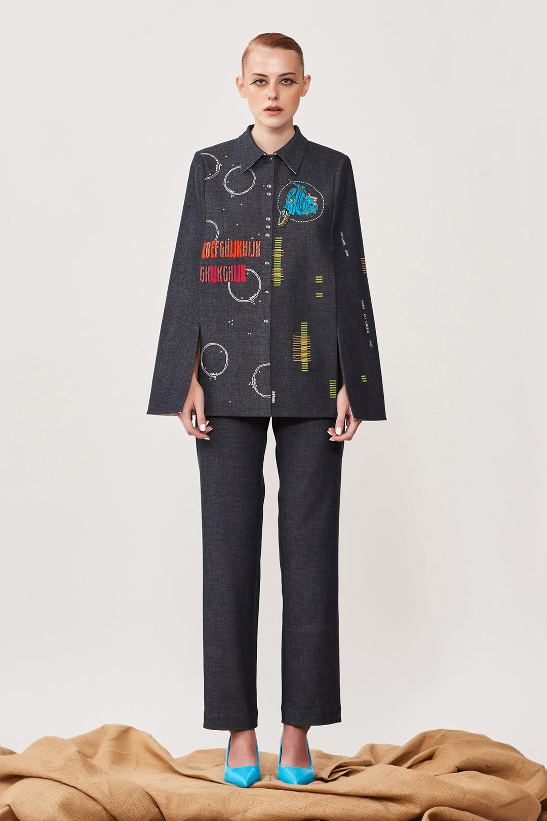 Ride a Vespa Cape With Narrow Pants