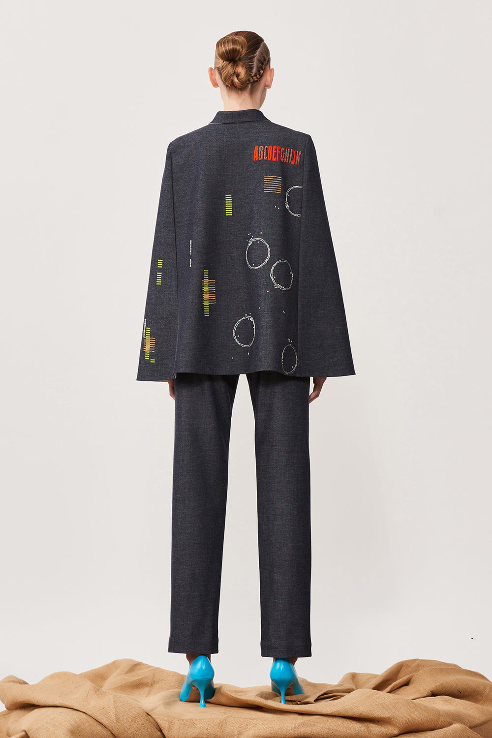 Ride a Vespa Cape With Narrow Pants