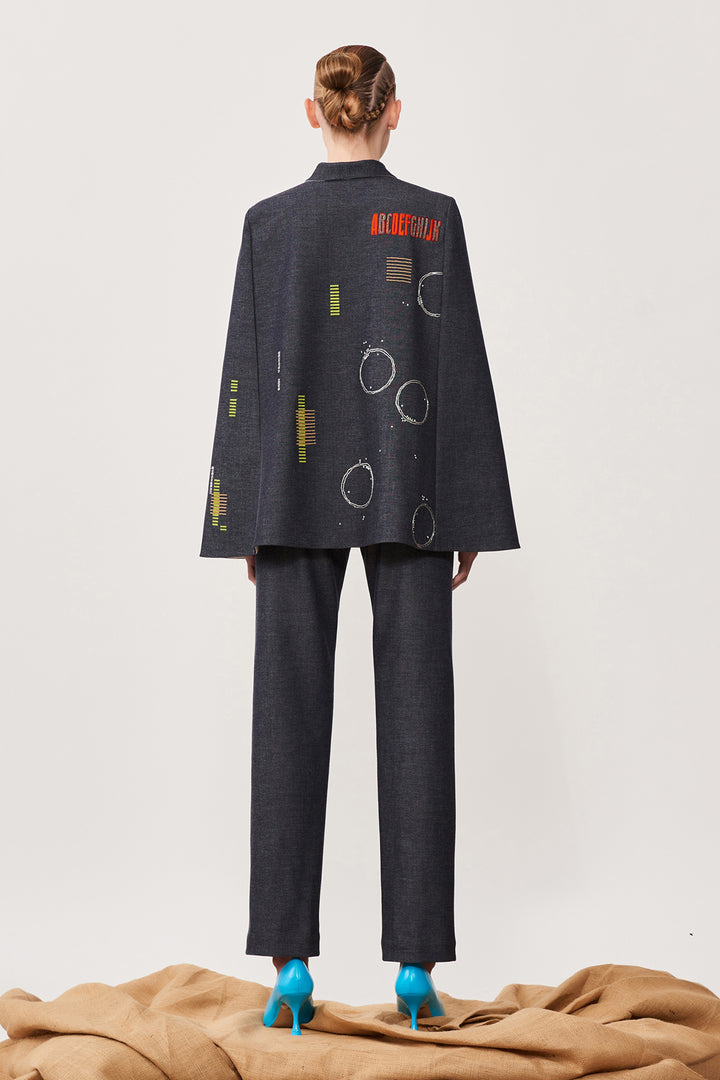 Ride a Vespa Cape With Narrow Pants